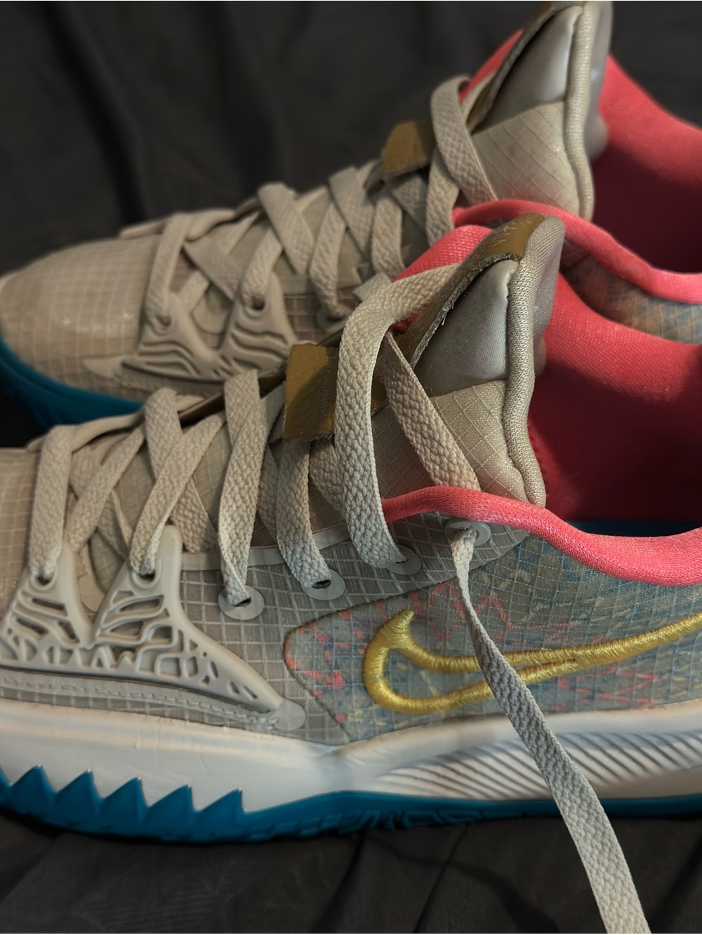 Nike Men’s Gray Sneakers with Pink Lining and Gold Swoosh